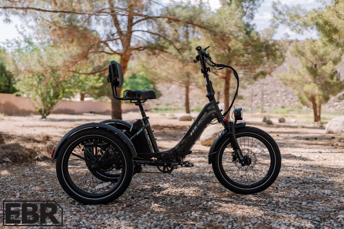 Lectric XP Trike 2 parked on a gravel path, Electric Bike Review photo